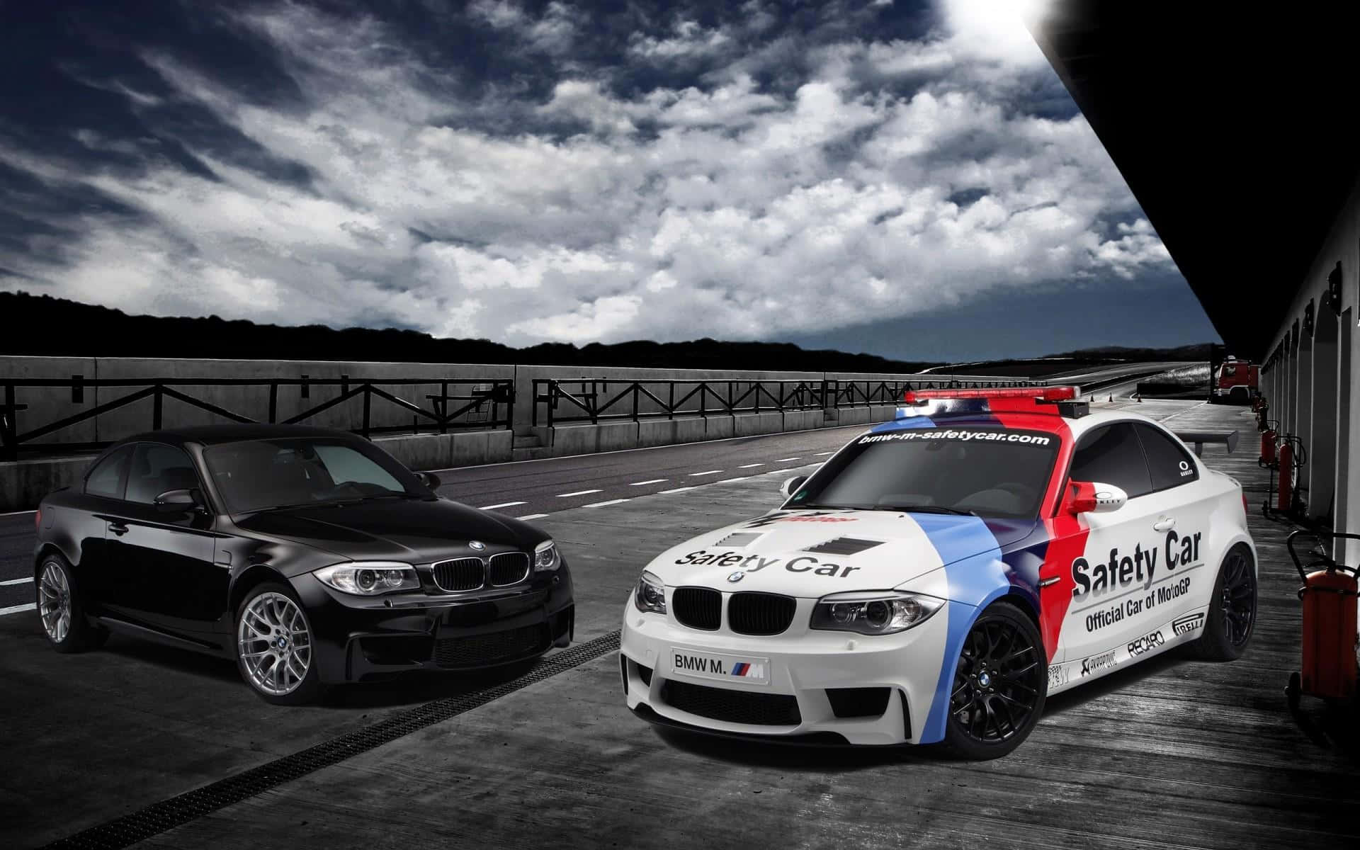 Safety Car ready for action on racetrack Wallpaper