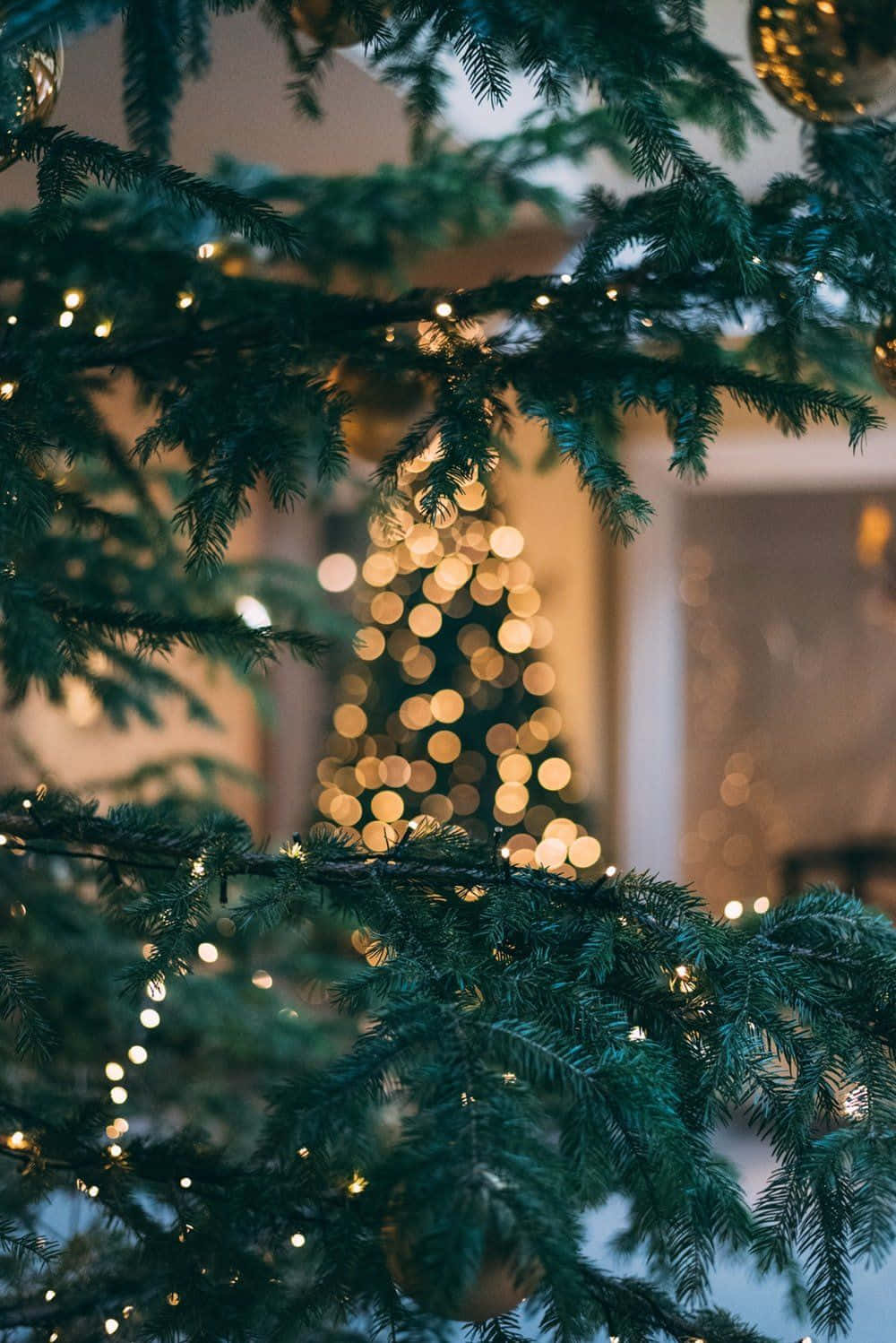 Sakupin ang Mahika ng Pasko gamit ang Pangarap na Background ng Telepono Wallpaper