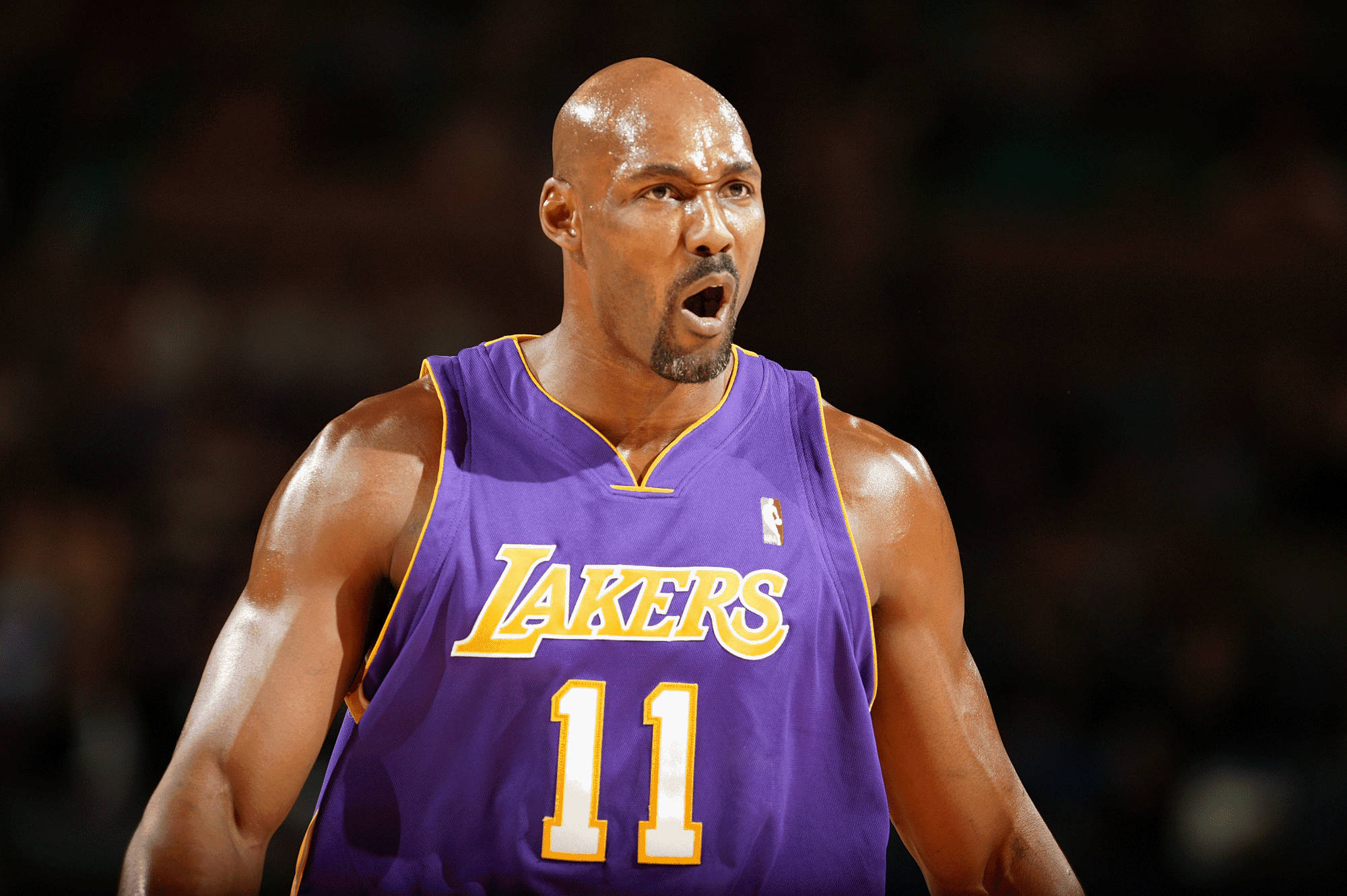 Si Karl Malone ay isang Retiradong Manlalaro ng Basketbol Wallpaper