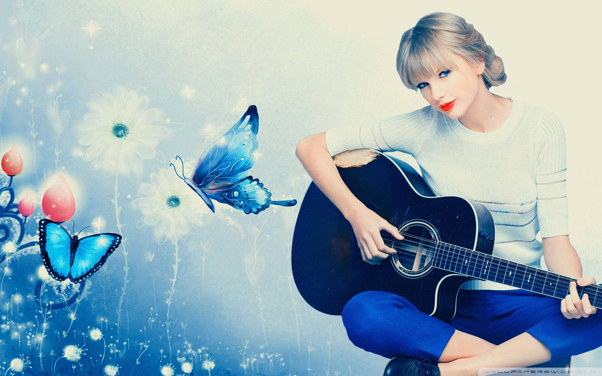 Si Taylor Swift na nagpapakasasa sa gitara Wallpaper