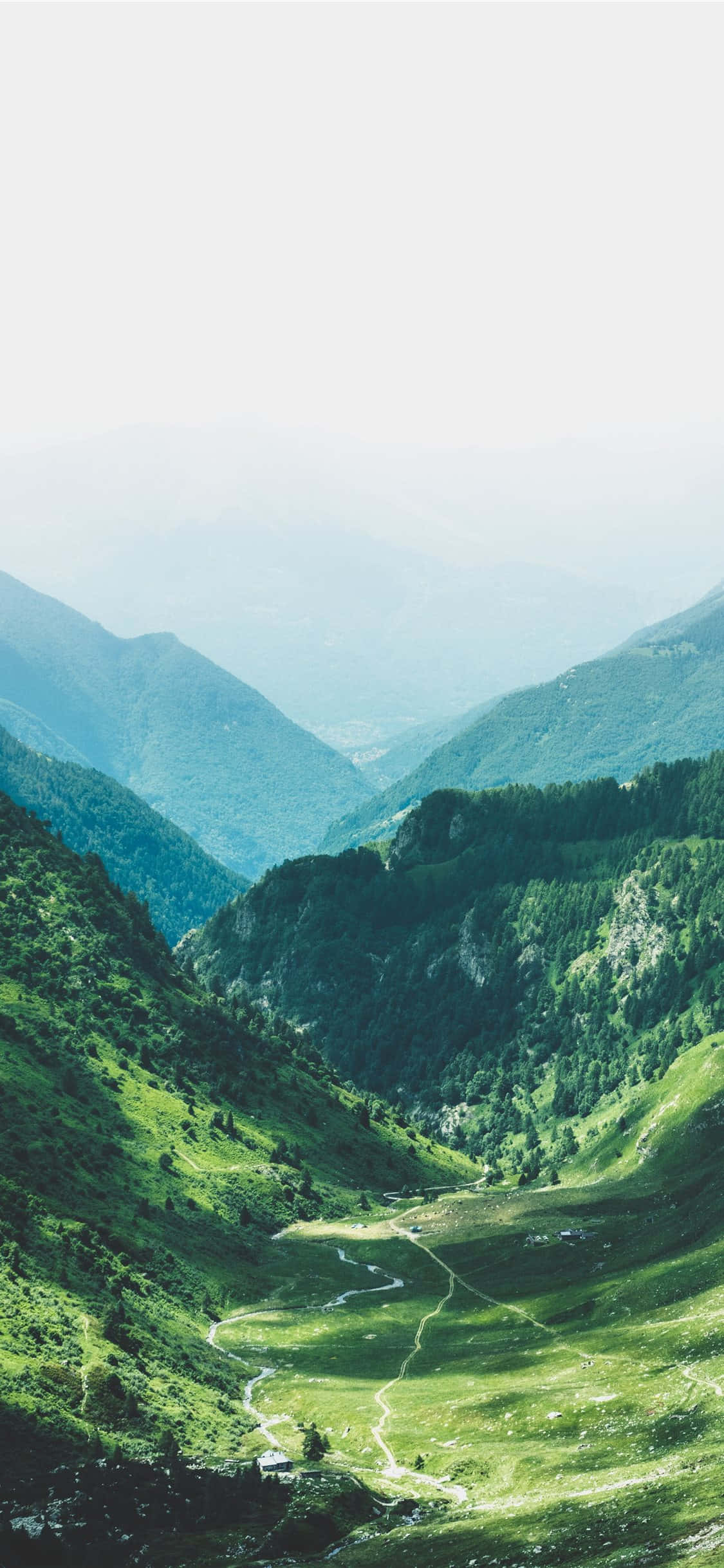 Standing on the mountain and looking at the vastness of the horizon. Wallpaper