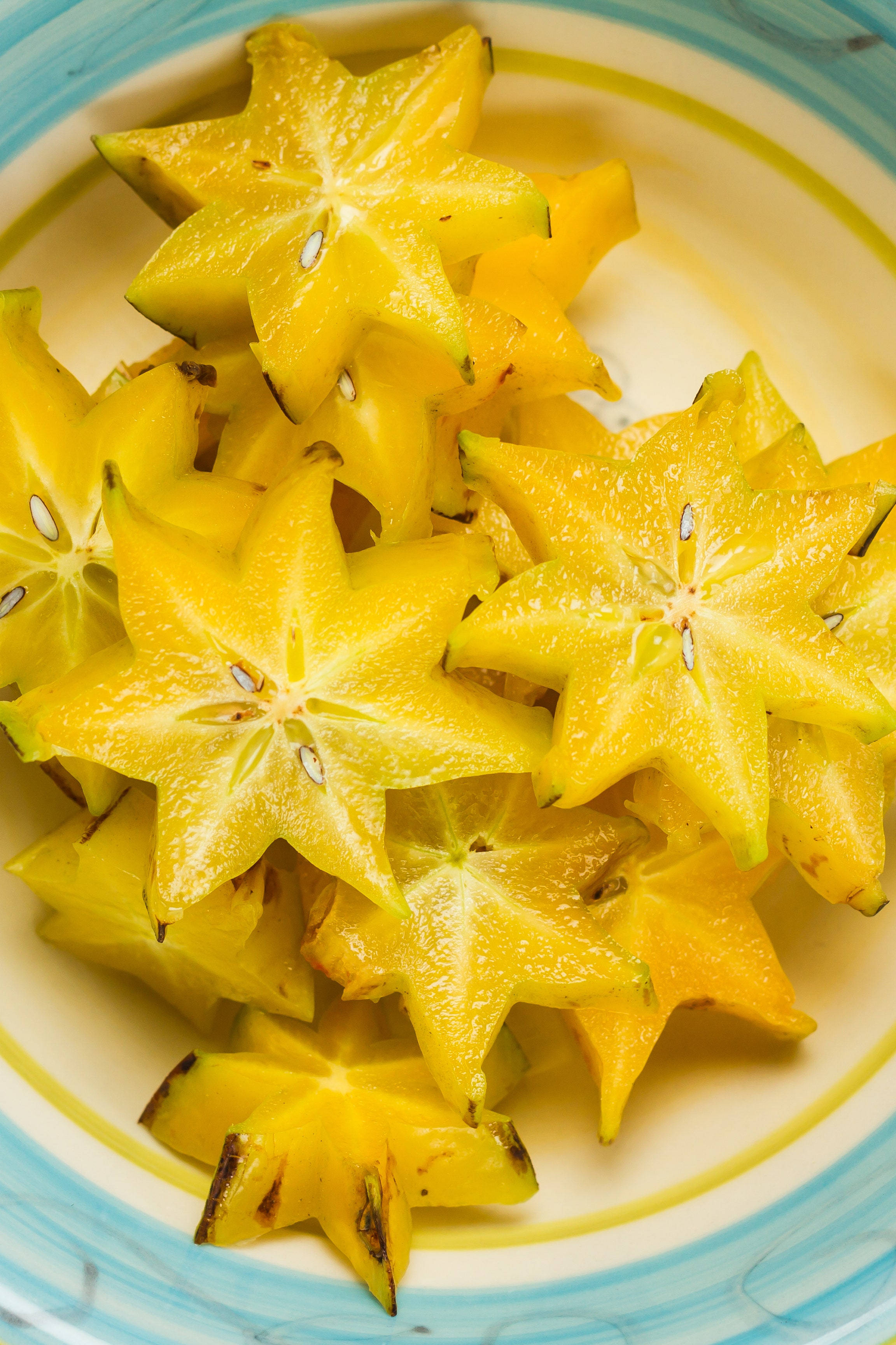 Mga Hiwa ng Carambola na Hugis Bituen Wallpaper