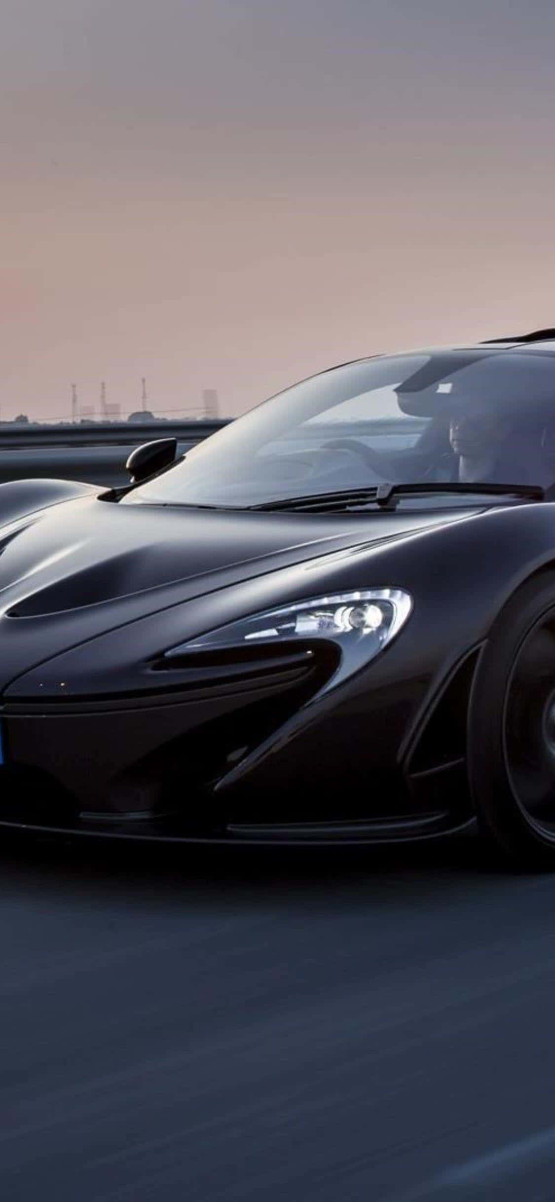 Sumakay sa manibela ng luho na iPhone Xs Mclaren 720s Wallpaper