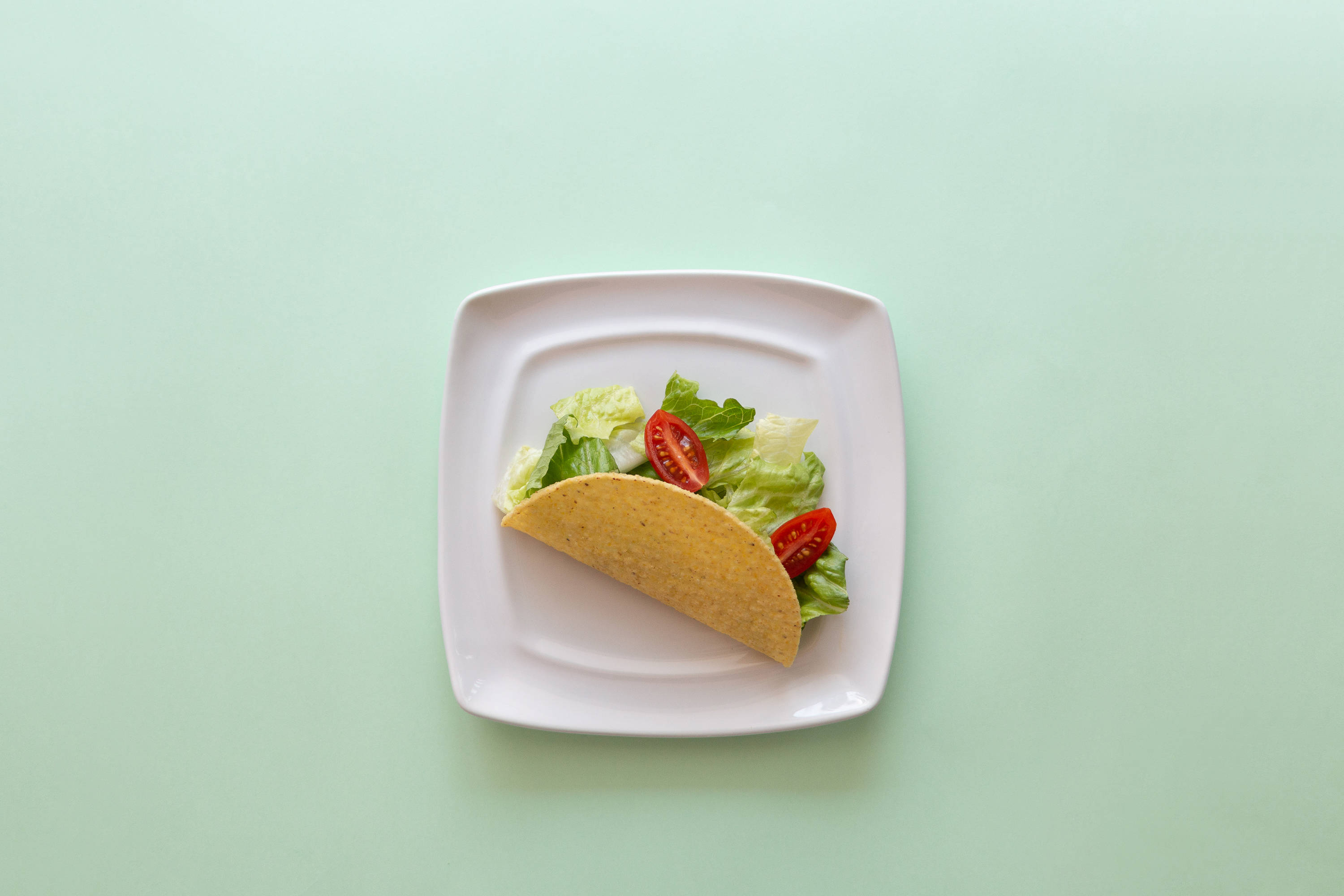 Taco sa Pastel na Luntiang Mesa Wallpaper