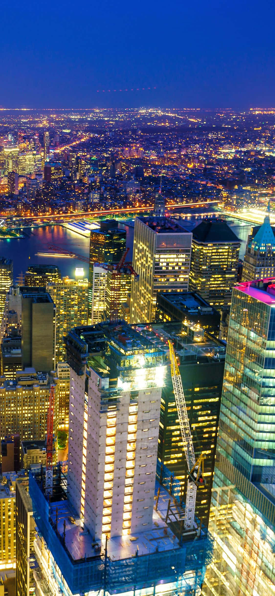 Tamasahan ang mga kahanga-hangang tanawin ng New York City sa magandang display ng iPhone X Wallpaper