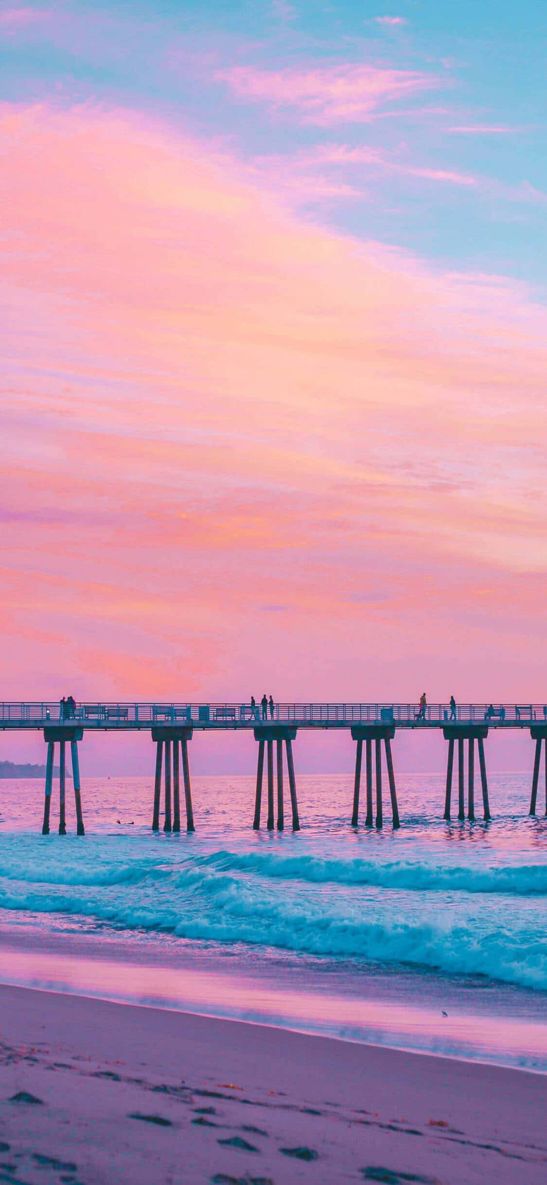 Tamasahin ang Nakakabiglang Paglubog ng Araw sa Baybay ng California gamit ang iPhone X Wallpaper