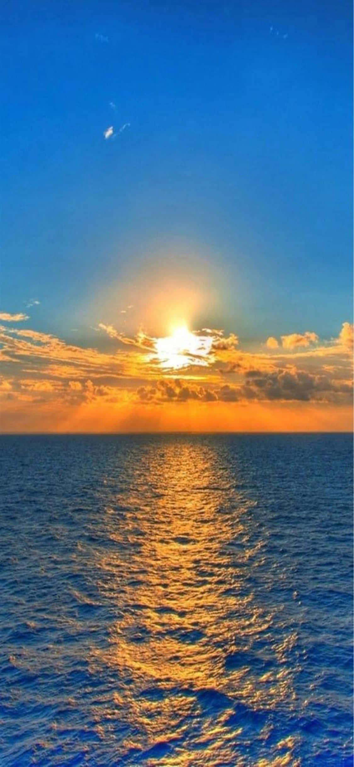 Tangkilin ang mga Nakakapighatang Tanawin ng Malibu Gamit ang iPhone XS Wallpaper