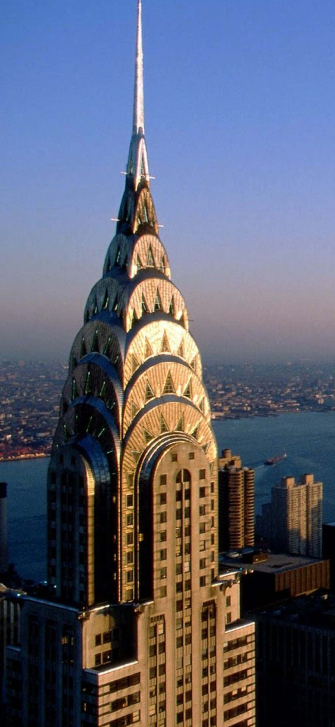 Tangkilin sa walang problemang buhay sa pagmamadali ng New York City gamit ang iPhone Xs Wallpaper