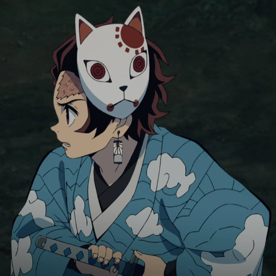 Tanjiro na may suot na Demon Slayer Mask Wallpaper