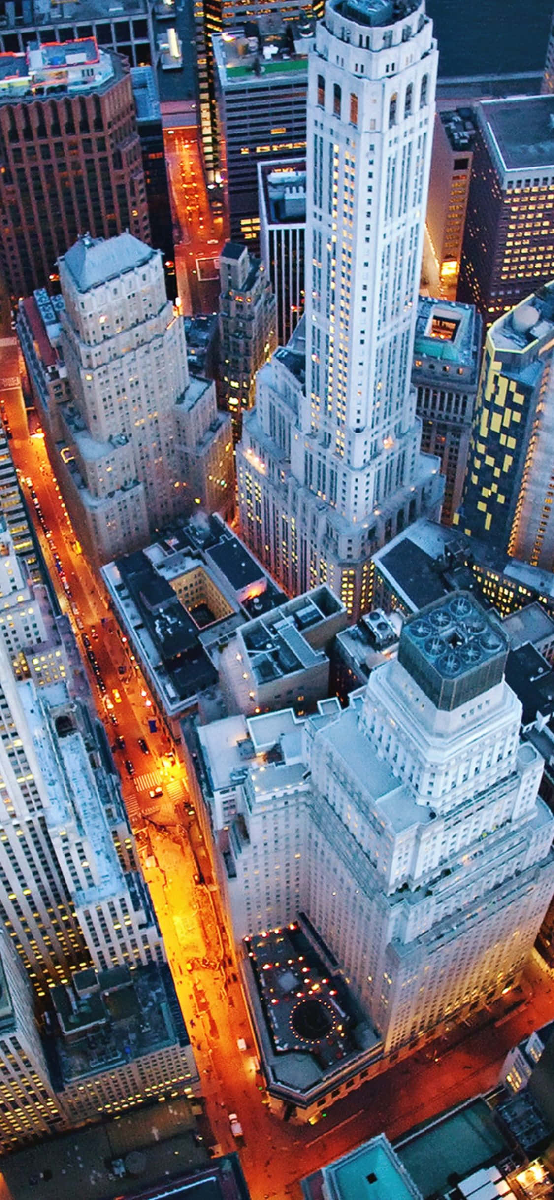 Tingnan ang kagandahan ng isang paglubog ng araw sa New York City gamit ang iPhone Xs. Wallpaper