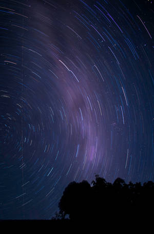Isang astonishing HD wallpaper ng time lapse ng stars sa galaxy