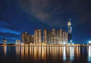 Panorama shot of the city outline at night wallpaper