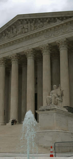 Authority Of Law Supreme Court Building Statue — iPhone Air Wallpaper