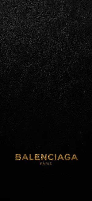 Balenciaga gold and black wallpaper
