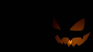 Cartoon Halloween na kumikinang na kalabasa wallpaper