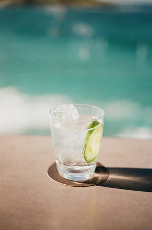 Chilled Gin With Sliced Cucumber — Lock Screen Wallpaper