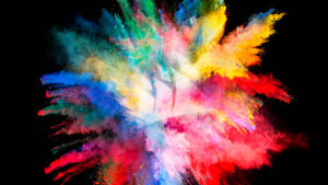 Colorful paint bomb exploding wallpaper.
