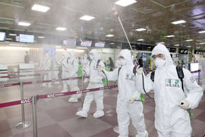 Covid-19 Global Impact: Earth Wrapped in a Protective Mask. — 3:2 Wallpaper