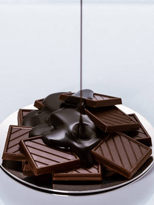 Dark chocolate syrup pour wallpaper. — 3:4 Wallpaper