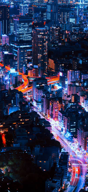 Bright skyscrapers at night iPhone 11 series wallpaper. — Samsung S21 Ultra Wallpaper
