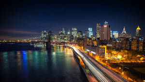 Maliliwan na cityscape ng New York wallpaper.