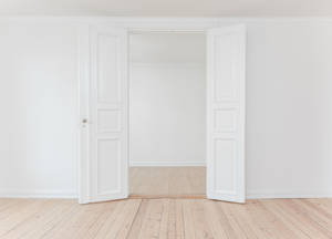 Minimalist White Room with wooden floor wallpaper