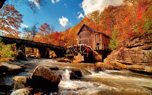 Grist Mill Maaraw na Taglagas wallpaper.
