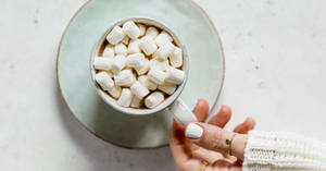 Hand Mini Marshmallows wallpaper — Winter Wallpaper