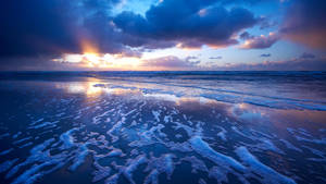 Sunset on the beach Macbook wallpaper
