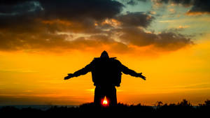 Inspirational Kneeling Man — Pro Display XDR Wallpaper