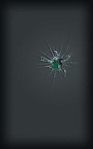 iPhone Cracked Screen Hole na Nagpapakita ng Loob — Tecno Megapad SE Wallpaper