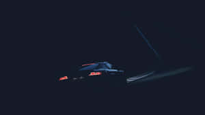 isang sasakyan na nagmamaneho sa madilim na kalsada — Dark mode Wallpaper