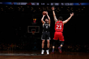 Joe Harris against Vanvleet wallpaper