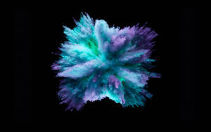 MacBook Pro Color Burst sa isang Black background wallpaper.