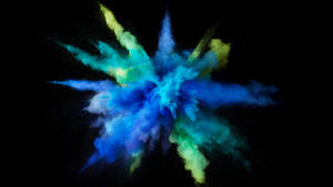 Asul at berde na color explosion art para sa MacBook Pro wallpaper.