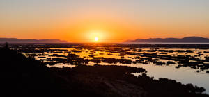 Wallpaper ng magandang paglubog ng araw sa Lawa ng Titicaca — Magandang paglubog ng araw Wallpaper