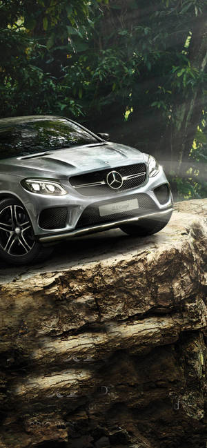 Mercedes iPhone X Forest Cliff — Pixel 8 Wallpaper