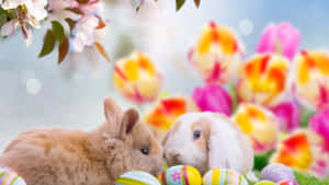 Mga Kaakit-akit na Easter Bunnies at Makukulay na Itlog sa Masiglang Background ng Tagsibol