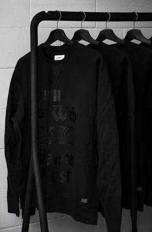 Minimalist Clothes Rack With Sweatshirts — Honor MagicPad4 Wallpaper