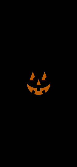 Wallpaper ng nakangiting kalabasa para sa Halloween ng iPhone — iPhone 15 Pro Wallpaper