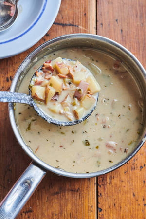 New England Clam Chowder Soup In Silverware Scoop — Huawei MatePad 12 X (2025) Wallpaper