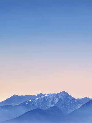 Pastel Horizon Over Mountains iPad wallpaper