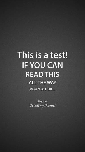 This Is A Test statement iPhone lock screen wallpaper.