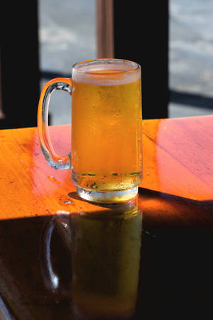 Sunlit Glass Of Beer wallpaper — 2:3 Wallpaper