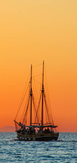 S10 sailboat orange sky wallpaper. — iPhone 18 Pro Wallpaper