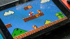 Wallpaper ng macro photography ng screen ng Nintendo Switch na may Mario