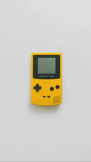 Simpleng dilaw na Game Boy Color wallpaper
