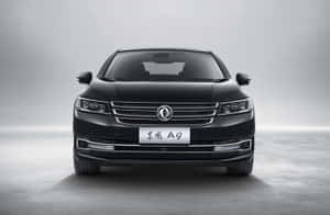 Sleek na Dongfeng Commercial Truck sa Highway — Surface Pro Wallpaper