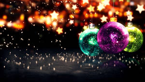 Starry colorful Christmas balls wallpaper — Studio Display Wallpaper