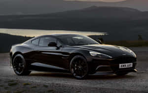 Nakakamang-mang na Aston Martin Vanquish na Gumagalaw — MacBook Pro M1 Wallpaper